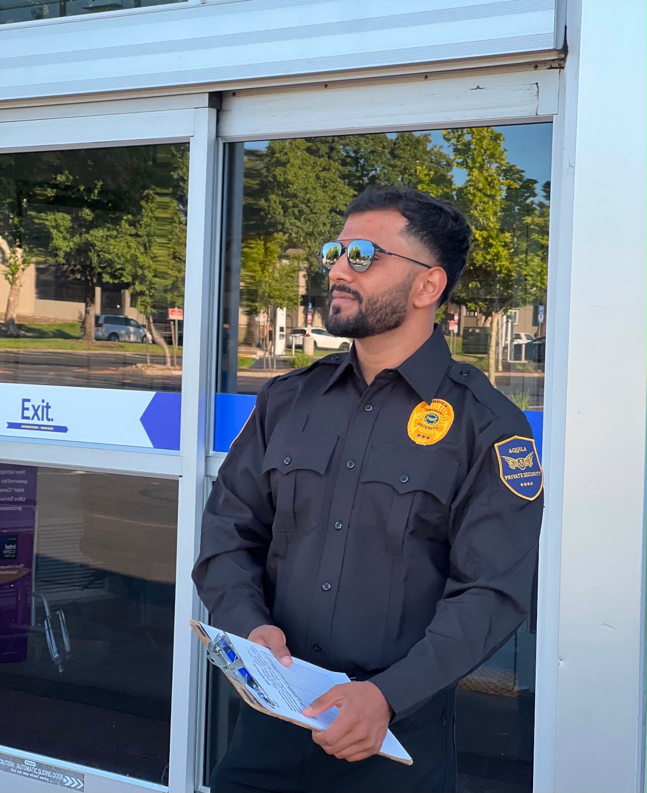 Aquila security officer conducting a commercial property assessment